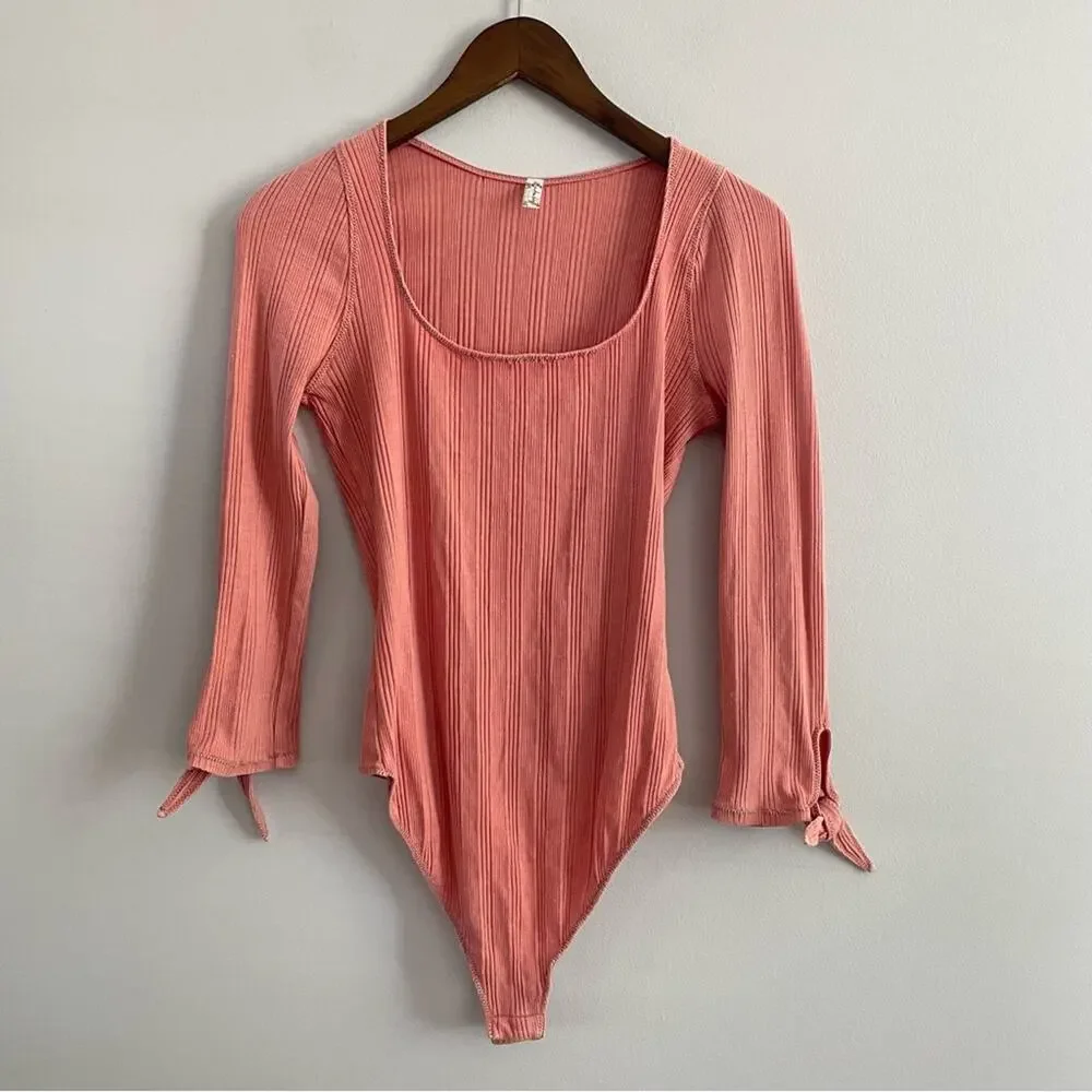 Free People | Women’s Move On Bodysuit Mooncake Pink Ribbed Long Sleeve Bow Cuff